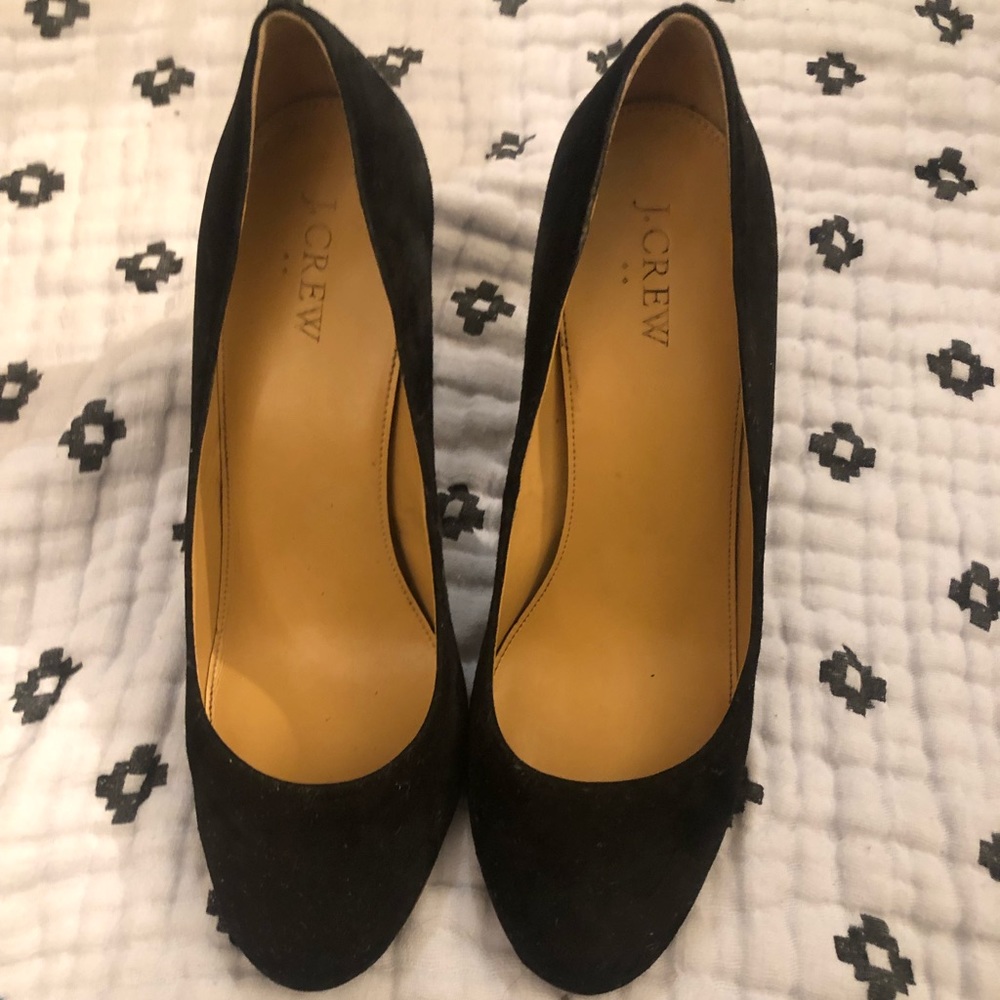 Black suede pumps